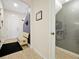 Bright entryway with tile flooring and bench at 2766 White Isle Ln, Orlando, FL 32825