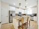 Modern kitchen with granite countertops and stainless steel appliances at 2766 White Isle Ln, Orlando, FL 32825