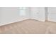 Bright bedroom with carpeted floor and window with blinds at 418 Caraway Dr, Kissimmee, FL 34759