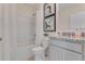 Clean bathroom with a tub, shower, and granite countertops at 437 Caraway Dr, Kissimmee, FL 34759