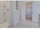 Clean bathroom with shower and walk-in closet at 437 Caraway Dr, Kissimmee, FL 34759