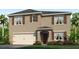 Two-story house with neutral siding, brown accents, and a two-car garage at 437 Caraway Dr, Kissimmee, FL 34759