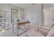 Modern home office with built-in shelving and a stylish desk setup at 437 Caraway Dr, Kissimmee, FL 34759