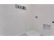 Convenient laundry room with built-in shelving at 437 Caraway Dr, Kissimmee, FL 34759