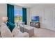 Spacious living area with comfy seating and window views at 437 Caraway Dr, Kissimmee, FL 34759