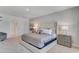 Luxurious main bedroom with a plush bed and en-suite bathroom access at 437 Caraway Dr, Kissimmee, FL 34759
