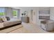 Bright and airy main bedroom with a comfortable bed and en-suite bathroom access at 437 Caraway Dr, Kissimmee, FL 34759