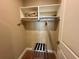 Spacious closet with shelving and hanging rods at 7451 Brooklyn Dr, Kissimmee, FL 34747