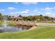Paradise Palms community entrance with fountain and landscaping at 8939 Bismarck Palm Rd, Kissimmee, FL 34747