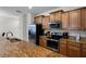 Modern kitchen with stainless steel appliances at 8939 Bismarck Palm Rd, Kissimmee, FL 34747