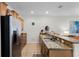 Kitchen with granite countertops and island at 8939 Bismarck Palm Rd, Kissimmee, FL 34747