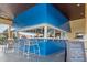 Outdoor pool bar with seating for residents and guests at 8939 Bismarck Palm Rd, Kissimmee, FL 34747