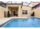 Private pool with spacious patio and plenty of sun at 8939 Bismarck Palm Rd, Kissimmee, FL 34747