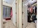 Bathroom with shower, toilet, and walk-in closet at 1215 Timberidge Dr, Lakeland, FL 33809