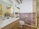Bathroom with shower, vanity, and toilet at 1215 Timberidge Dr, Lakeland, FL 33809