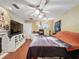 Serene bedroom, ceiling fan, lots of light, wood floors at 1215 Timberidge Dr, Lakeland, FL 33809