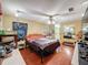Relaxing bedroom with ceiling fan and wood floors at 1215 Timberidge Dr, Lakeland, FL 33809
