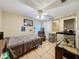 Bedroom with double bed, ceiling fan, and fish tank at 1215 Timberidge Dr, Lakeland, FL 33809