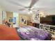 Spacious bedroom with wood floors and a view to the bathroom at 1215 Timberidge Dr, Lakeland, FL 33809