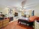 Cozy bedroom with fireplace, wood floors, and ample closet space at 1215 Timberidge Dr, Lakeland, FL 33809