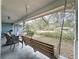 Inviting front porch with a porch swing at 1215 Timberidge Dr, Lakeland, FL 33809