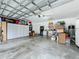 Large garage, well-organized with overhead storage at 1215 Timberidge Dr, Lakeland, FL 33809
