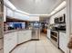 Bright kitchen offering an island and stainless steel appliances at 1215 Timberidge Dr, Lakeland, FL 33809