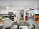Spacious kitchen featuring granite countertops and stainless steel appliances at 1215 Timberidge Dr, Lakeland, FL 33809