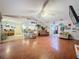 Bright and spacious living room with hardwood floors and fireplace at 1215 Timberidge Dr, Lakeland, FL 33809