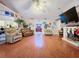 Spacious living room with hardwood floors and fireplace at 1215 Timberidge Dr, Lakeland, FL 33809