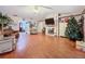 Spacious living room with hardwood floors and fireplace at 1215 Timberidge Dr, Lakeland, FL 33809