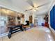 Bright sunroom with tiled floors and access to backyard at 1215 Timberidge Dr, Lakeland, FL 33809