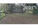 Mobile home on a large lot with surrounding trees and vegetation at 15924 Old Cheney Hwy, Orlando, FL 32833