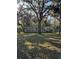 Mobile home with deck, situated on a spacious lot with mature trees at 15924 Old Cheney Hwy, Orlando, FL 32833