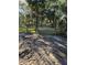 Property with gated entrance and mature trees at 15924 Old Cheney Hwy, Orlando, FL 32833