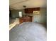 Kitchen features wood cabinets, tile countertops, and tile flooring at 15924 Old Cheney Hwy, Orlando, FL 32833