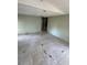Living area with tile flooring and access to the back of the house at 15924 Old Cheney Hwy, Orlando, FL 32833