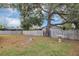 Large backyard with a firepit and a stone fountain at 1613 Christy Ave, Orlando, FL 32803