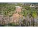 Aerial view of property with cleared land near lake at 2008 Prescott Blvd, Deltona, FL 32738