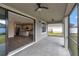 Screened porch with view of kitchen at 2221 Avian Loop, Kissimmee, FL 34741