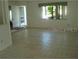 Spacious living room with tile floors and ample natural light at 2309 Dunbury Ct, Winter Park, FL 32792