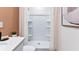 A clean and spacious shower stall with built-in shelves at 2373 Penguin Blvd, Davenport, FL 33837