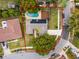 Aerial view of single Gathering home with solar panels and pool at 471 Bonifay Ave, Orlando, FL 32825