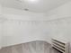 Spacious walk-in closet with wire shelving at 4731 Summerbridge Cir, Leesburg, FL 34748
