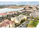 Aerial view of community with lake and surrounding landscape at 4814 Cayview Ave # 40613, Orlando, FL 32819