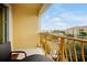 Private balcony with table and chairs, offering a scenic view at 4814 Cayview Ave # 40613, Orlando, FL 32819