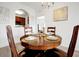 Dining room with round wooden table and four chairs at 4814 Cayview Ave # 40613, Orlando, FL 32819