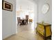Entryway with decorative chest and view into dining area at 4814 Cayview Ave # 40613, Orlando, FL 32819