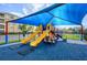Shaded playground with slides and play equipment at 4814 Cayview Ave # 40613, Orlando, FL 32819