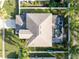 Aerial view of house showing roofline, pool, and backyard at 488 Acacia Tree Way, Kissimmee, FL 34758